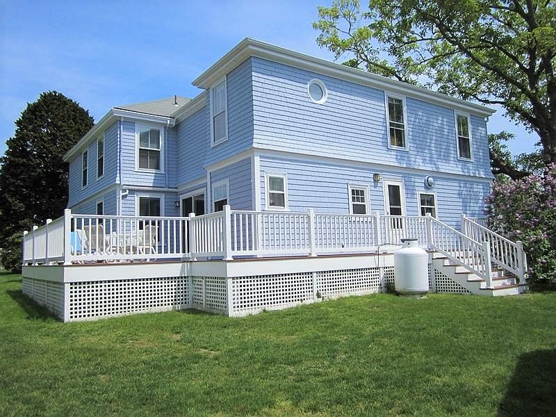 Back Entrance and large deck overlooking yard