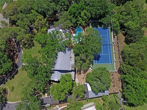 Set on a large tree-lined Lot, the home caters to you whether you love indoor activities or you love