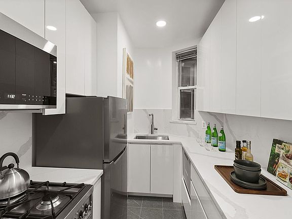 3rd image of 237 E 12th St APT 2A