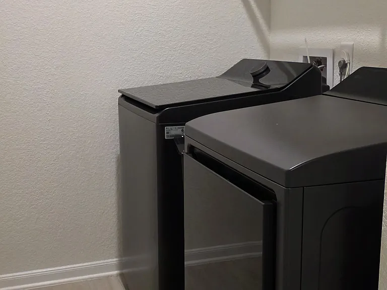 Dedicated Laundry Room with built in shelf