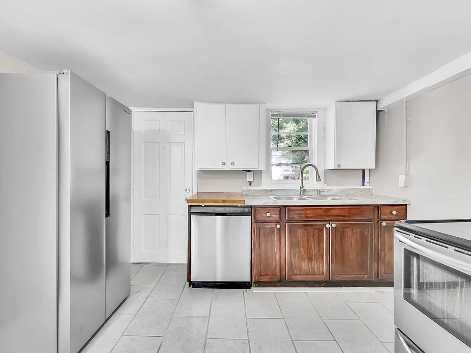 Fully remodeled kitchen with brand new stainless steel appliances, including dishwasher and washer/dryer!