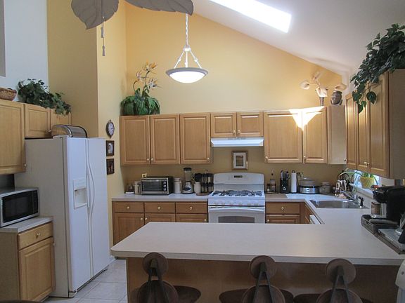 open, sunny kitchen & dining