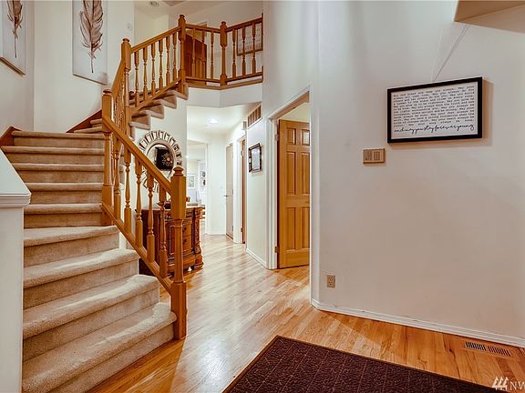Amazing open staircase prompts loads of creative decorating options for the holidays.