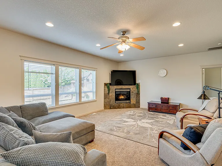 Left to the primary dining area, kitchen, or back deck, straight through to the office, or right to the downstairs half bath or garage