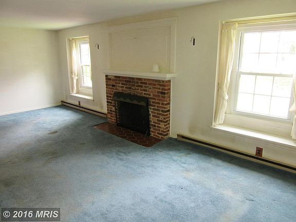 Living Room with Wood-Burning Fireplace