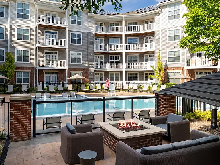 Pool and courtyard with fire pit
