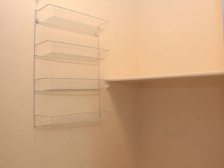 Inside laundry room that will accommodate full size washer & dryer. Cannot do a stackable.