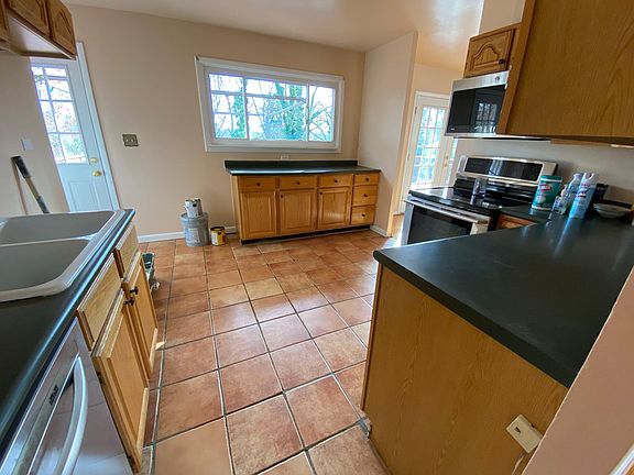 Tiled Kitchen comes with SS refrigerator (not in photo)