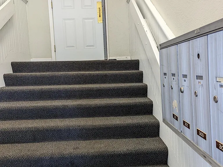 Main building entry way with individual mailboxes