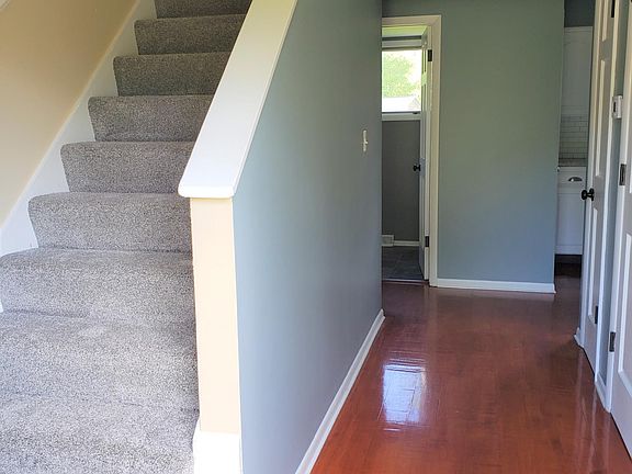 From Front door, looking towards Main Floor Bathrm and Kitchen to right