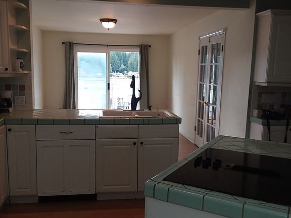 Kitchen view into family roomanddeck