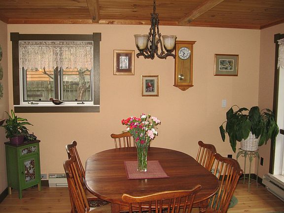 Dining room with wood ceilings