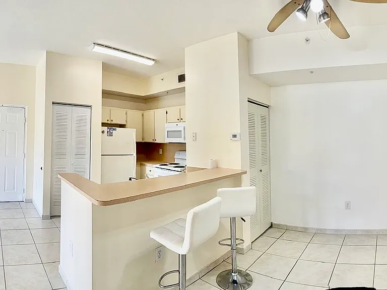 ample counter with stools