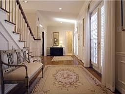 Welcome guests into your light-filled Foyer with beautiful hardwood floors, a feature found througho