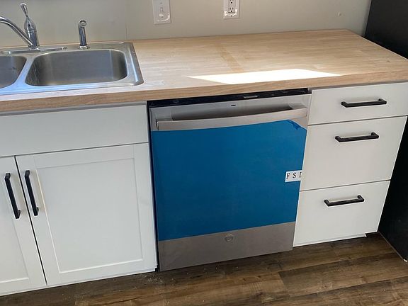 NEW kitchen cabinets, appliances, flooring, and countertops!