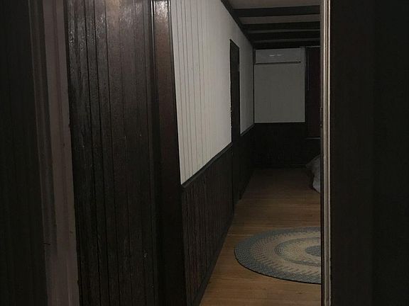 View from BR passageway (hardwood floor) into Living Room