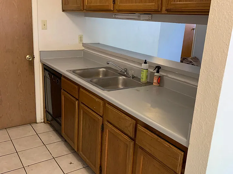 Kitchen open to living and bar area.