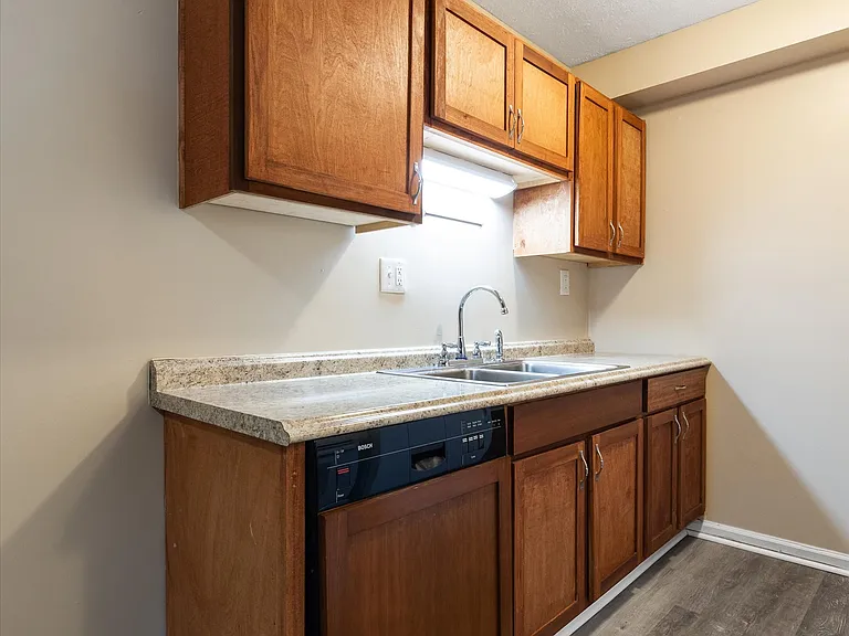 Eat-In Kitchen with Luxury Plank Flooring, Dishwasher, Fridge and Stove!