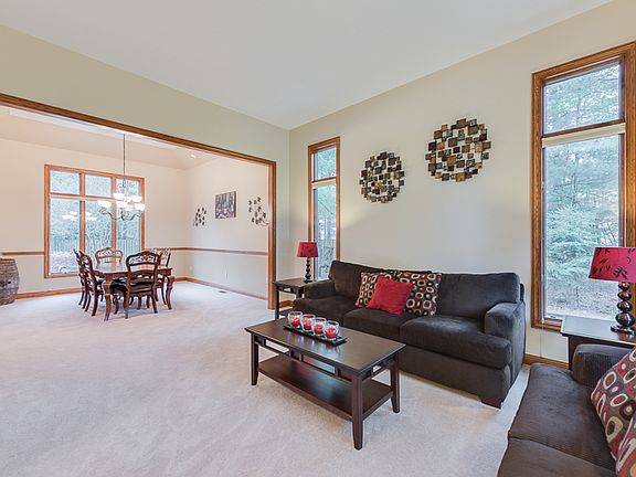 Another view of the Living Room with Dining Room in the background