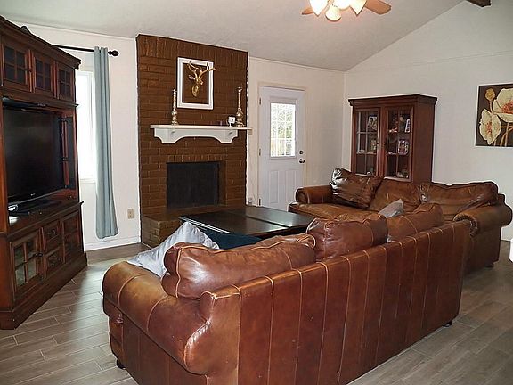 Family room with cozy fireplace.