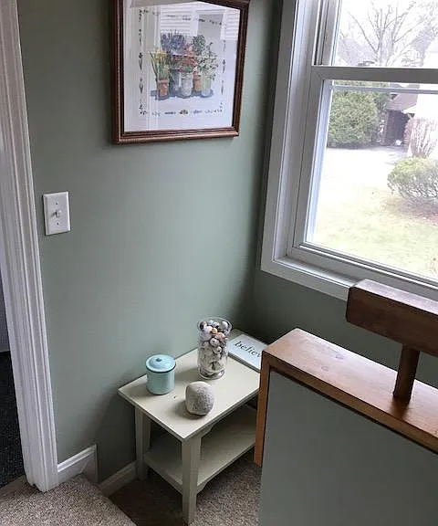 Second floor landing with washer and dryer in closet in hallway