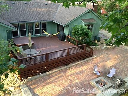 Deck and Patio
						:
						New 26x24' deck and raised limestone/brick patio.