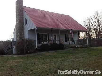 Front View
						:
						3 Acres, metal roof, rocking chair front porch