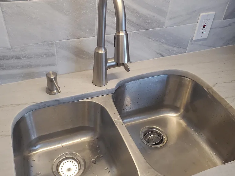 Large double deep sink with soap dispenser