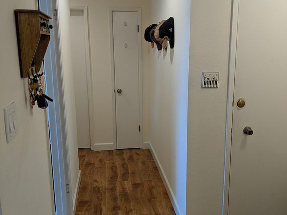 Entrance will hallway leading to bedroom