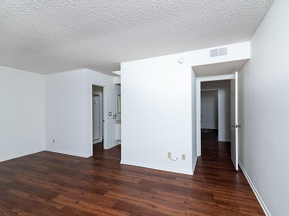 Large bedroom 18'x12' with bath, walk in closet. Room for king size bed, plus office area.