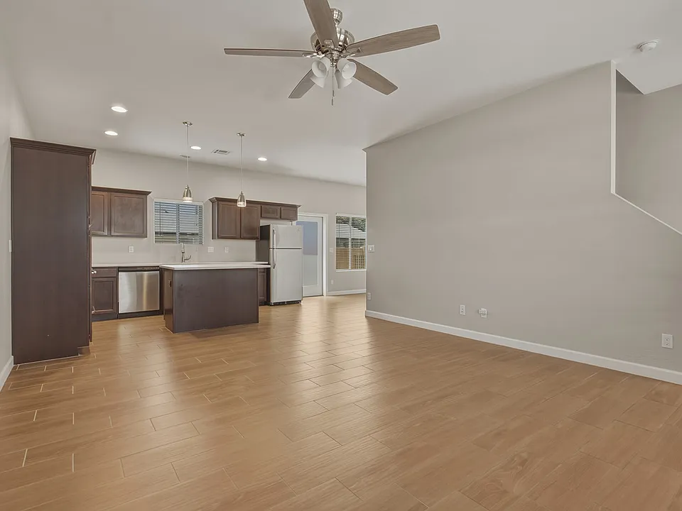 Kitchen opens to living room