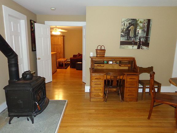 2nd floor kitchen and dining / living areas. Wood burning stove.