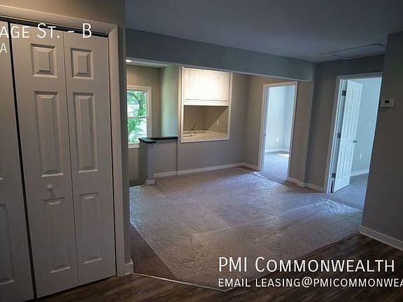 Unit B looking from kitchen across living area and entry steps