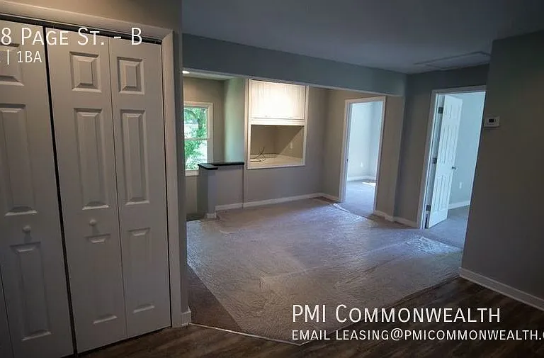 Unit B looking from kitchen across living area and entry steps