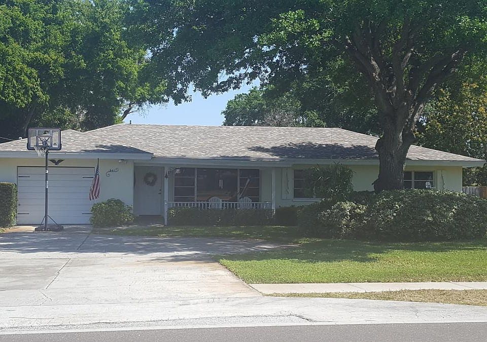Front porch with large oak