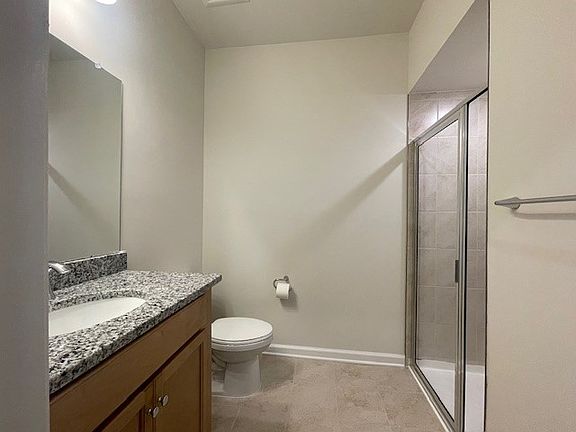 Full bathroom with standing shower on 1st Floor