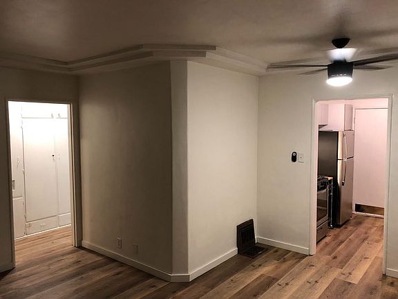 Living room looks into the kitchen