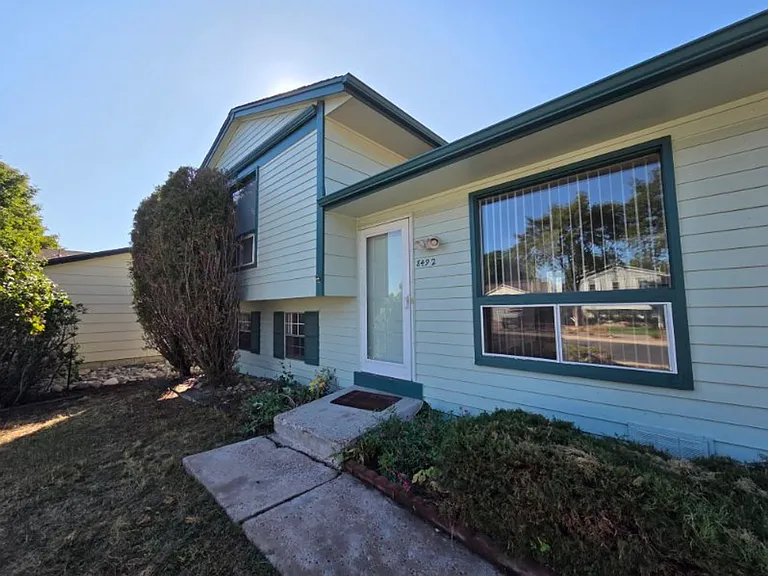 8492 W Eastman Pl — Photo 1