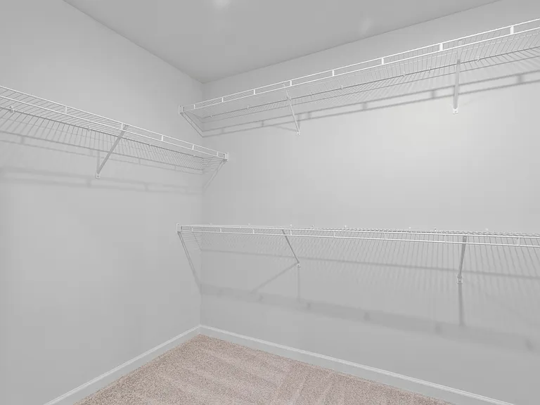 Huge walk-in closet in the primary bedroom.