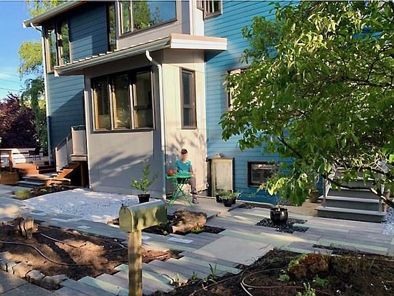 The house and entry to apartment