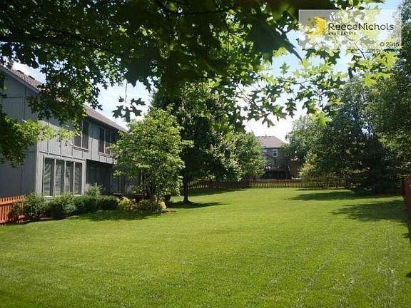 Lushly landscaped, fenced yard at the end of a quiet cul-de-sac.