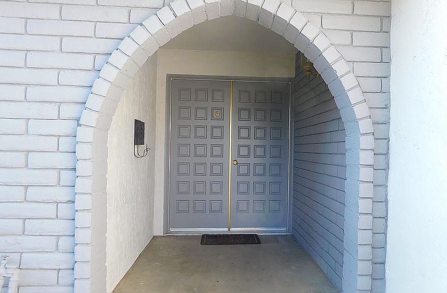 Porch and double door entry.