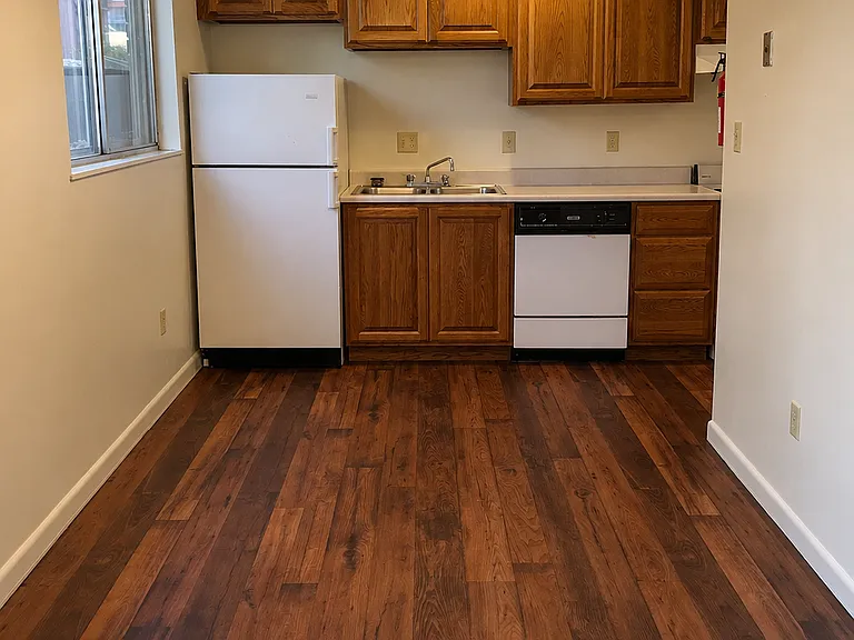 Dining Area - Appliance finishes, flooring, and countertop styles may vary by unit.