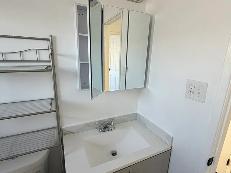 Medicine cabinet above bathroom sink