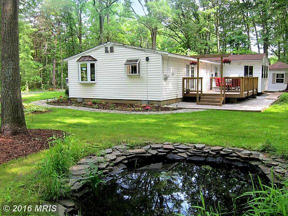 Newly Remodeled Bay Rancher in Tranquil Setting