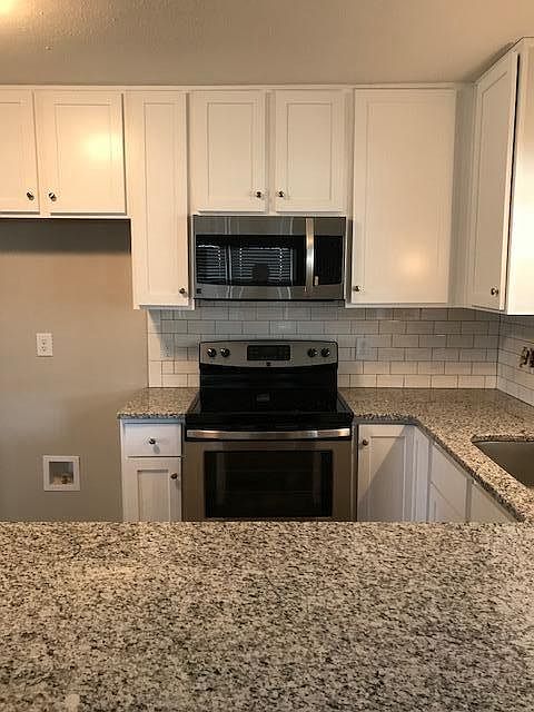 Subway tile back splash, new microwave and range