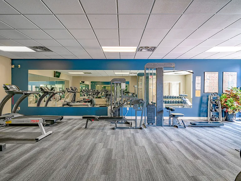 Stay active in our 24-hour fitness center, featuring a variety of workout equipment.
