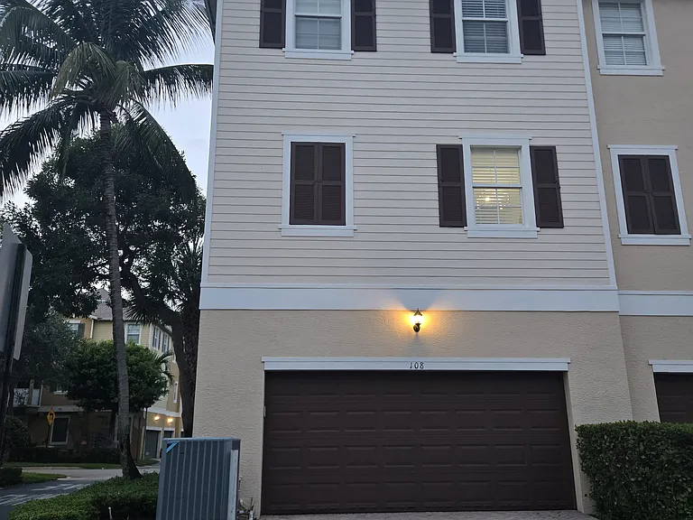back entrance with garage