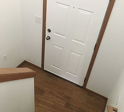View from upper level to main entrance (Different Property)