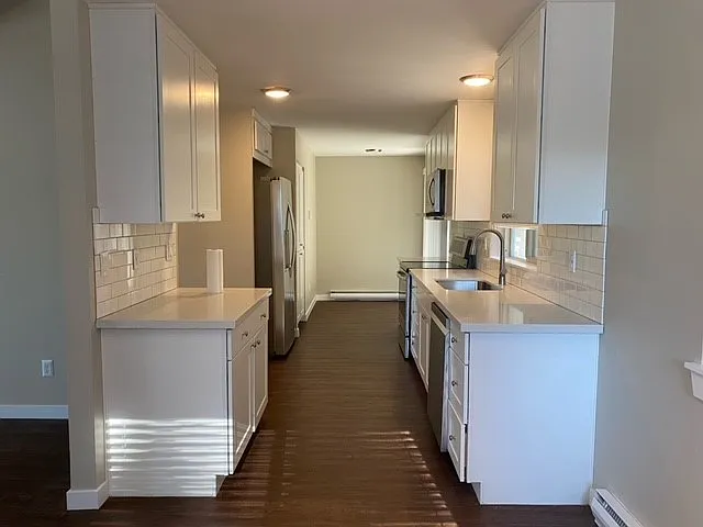 Town Squire Apartments — Photo 18